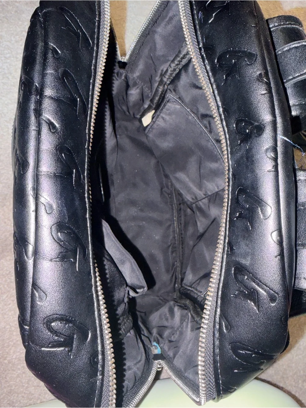 Monogram-Embossed Black Mini Backpack - Sleek Everyday Carry